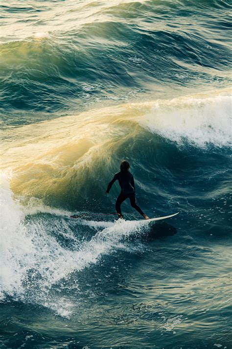 Surfing Waves Man Sea Hd Phone Wallpaper Peakpx