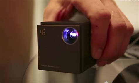 Uo Smart Beam Laser Cube Sized Portable Mini Projector That Works On