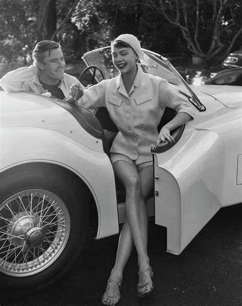 A Young Model Sitting In A Convertible Sports Car Photograph By Karen