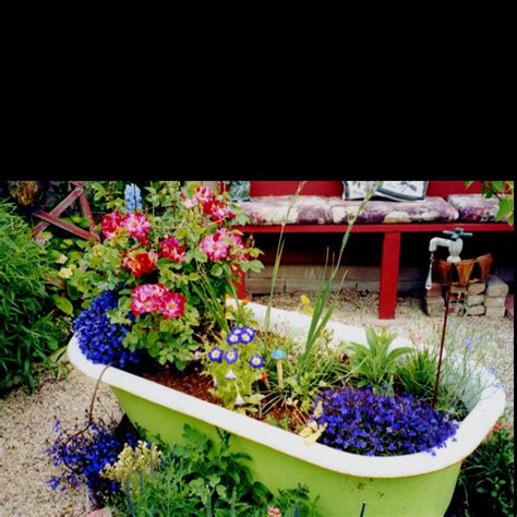 Do you want a water garden but don't have the space in your yard for a large one? Bath tub garden | Garden bathtub, Backyard garden, Garden