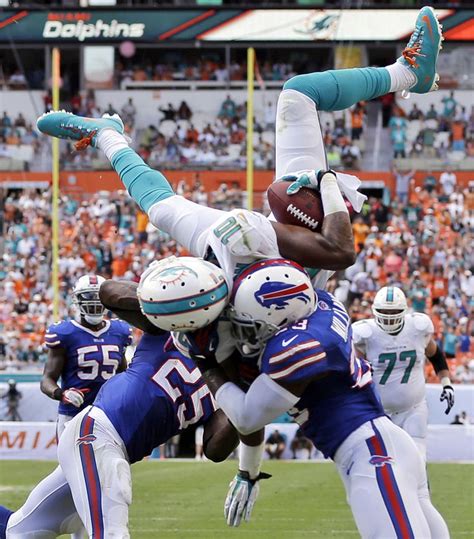 Dolphins Highlights Nfl Football Pictures Nfl Football Hits