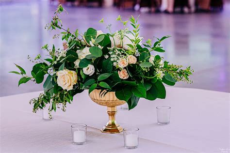 Low And Lush White Flower Centerpieces White Flower Arrangements