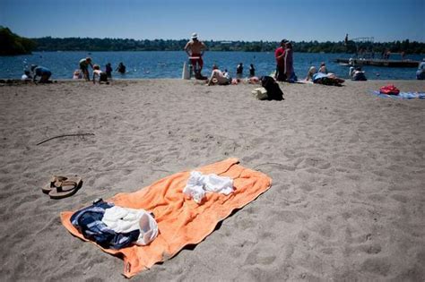 Nearly Nude Man Fights To Keep Photographing Sunbathing Gals