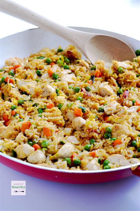 A fried rice recipe with shredded chicken, rice, everyday vegetables, eggs, and soy sauce. Chicken Fried Rice {better than take-out!} - A Pinch of ...