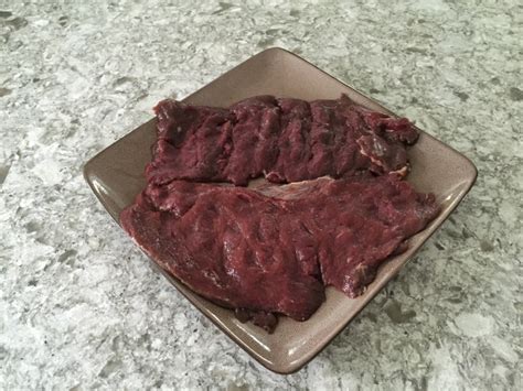 Place a venison steak on the wax paper and cover the venison with another sheet of wax paper. How to Tenderize Venison - Venison Thursday
