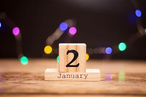 January 2nd Day 2 Of January Set On Wooden Calendar On Dark Background