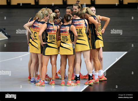 Manchester Thunder Players Huddle At The Side Of The Court Hi Res Stock
