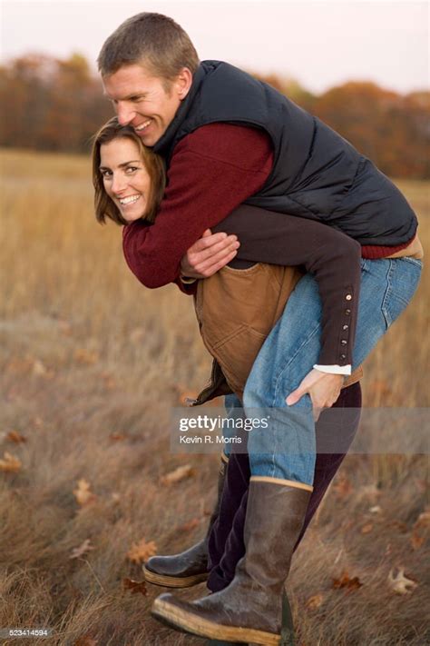 Woman Giving Man Piggyback Ride Photo Getty Images