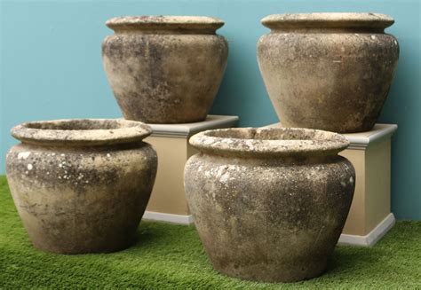 A Set Of Four Reclaimed Weathered Stone Planters Uk Architectural