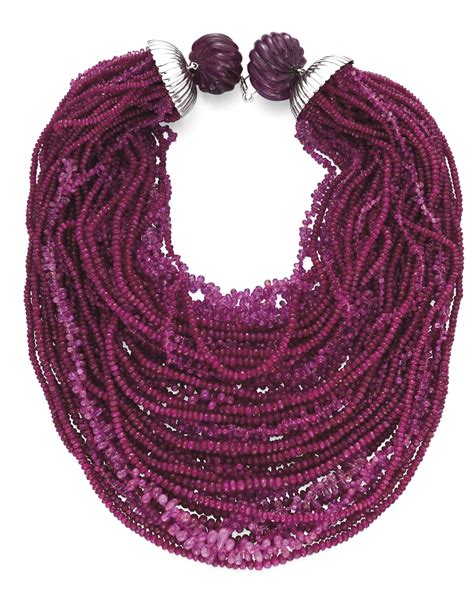 A Multi Strand Ruby Bead Necklace Composed Of Forty Four Strands Of