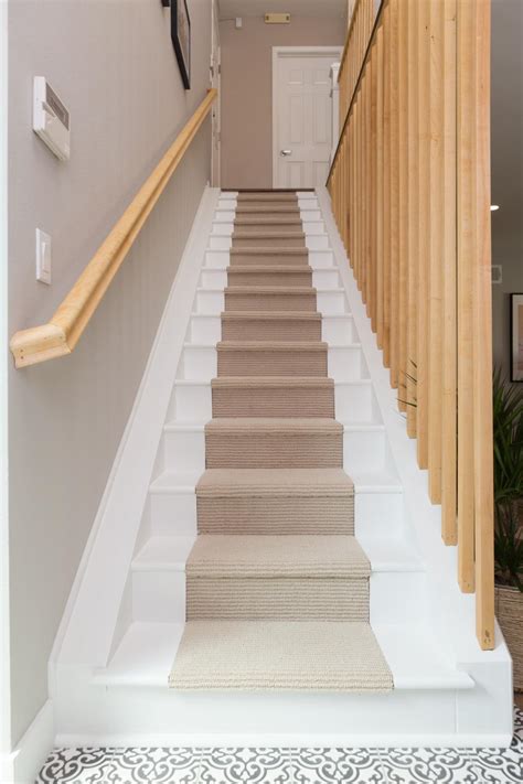 Contemporary White Stairs with Neutral Wooden Rails | HGTV