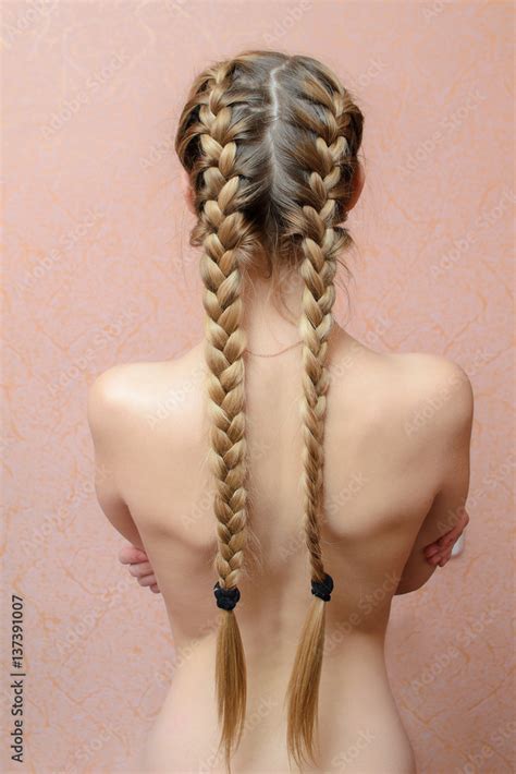 Blonde Girl With The Naked Back And Long Hair Braided Stock Photo Adobe Stock