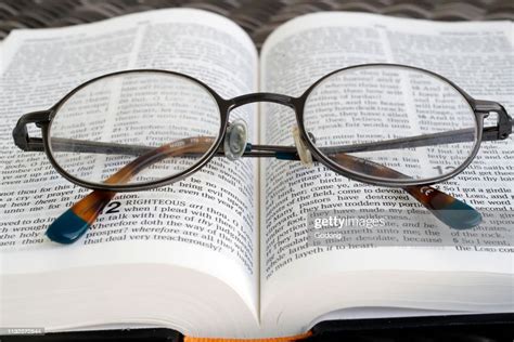 Pair Of Glasses On An Open Bible News Photo Getty Images
