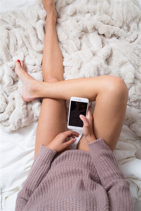 Overhead Bew Of A Woman In Bed With Smartphone By Stocksy Contributor Ohlamour Studio Stocksy
