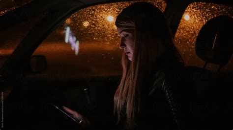 Close Up Of A Beautiful Blonde Woman In The Car At Night By Stocksy Contributor Boris