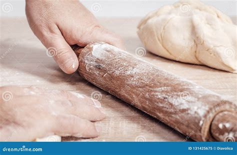 Male Cook Rolls Out Dough With Rolling Pin Stock Image Image Of