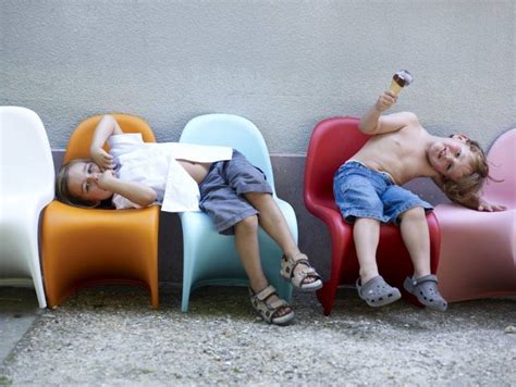 Verner panton was an influential figure in the development of design during the 1960s and '70s. Vitra Panton Junior Chair mandarijn