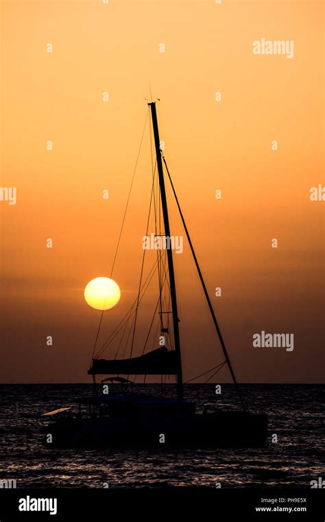 Sail Boat Silhouette At Sunset Stock Photo Alamy