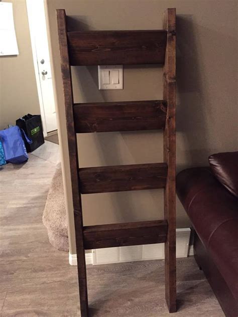 Who said ladders can be used only for climbing up and down? Ana White | Quilt Ladder Rack - DIY Projects