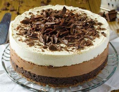 A fast and easy no bake cheesecake with a graham cracker crumb crust and a creamy smooth cheesecake filling. Recipe: Triple Chocolate Cheesecake - Homebakers.co.in