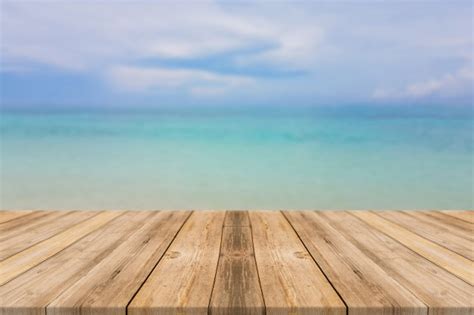 Download now for free this wood table transparent png image with no background. Free Photo | Wooden board empty table top blur sea & sky ...