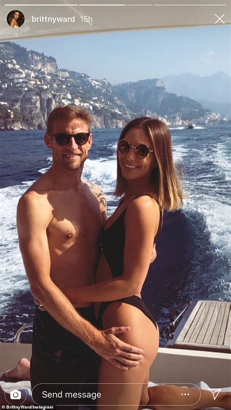 Jenson Button s fiancée Brittny Ward slips into a cut out swimsuit