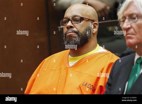 Defendant Marion Suge Knight Attends A Hearing With Attorney Thomas