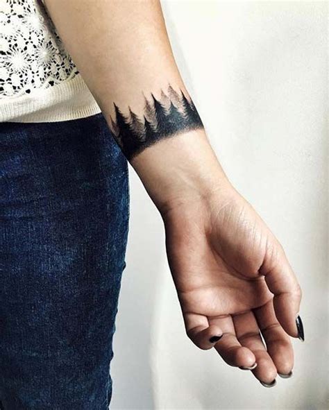 An armband tattoo essentially takes the shape of a bracelet. forest wristband tattoo ormanlı bilek bandı dövmesi ...