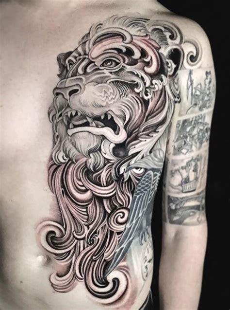 To build a space so artist and clients alike can come together and create beautiful one of a kind tattoos. Lion chest piece by Izzy at Ink & Dagger Tattoo, Atlanta : tattoos