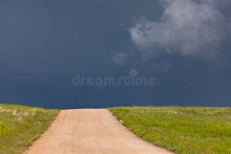 Dirt Road In Sunshine With Storm Stock Image Image Of Hills Dark