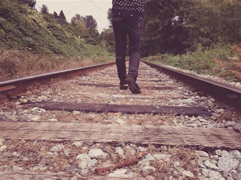 Walking On Train Tracks High Quality People Images ~ Creative Market