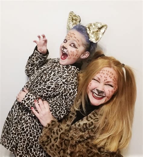 Jumpsuit, tail and cat ear headband shoes not inc. Easy DIY Leopard Costume ~ Confessions of a Refashionista