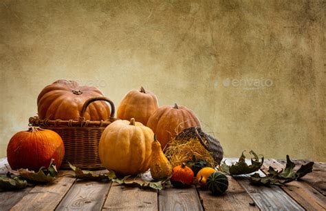 Thanksgiving Concept With Colorful Pumpkins And Fall Leaves On Rustic