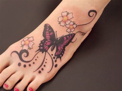 Awesome white flowers and butterfly foot tattoo. 25 Cute Butterfly Foot Tattoo Design Ideas For Girls ...