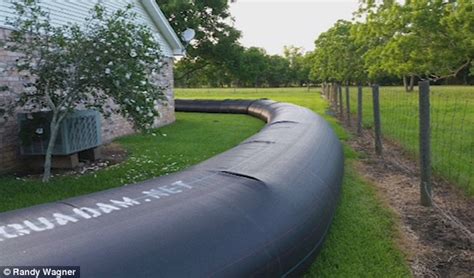 Texas Man Uses A Dam Filled With Water To Keep His House Dry During Flood Daily Mail Online