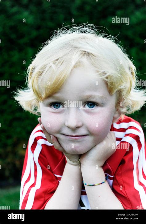Five Year Old Boy Wearing A Fc Bayern Munich Soccer Dress Head Resting