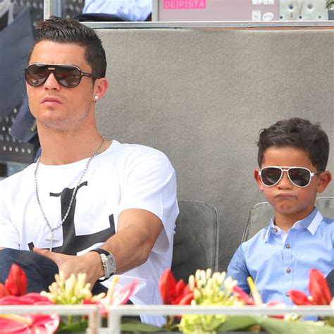Watch Cristiano Ronaldo Adorably Teach His Son How To Do Crunches