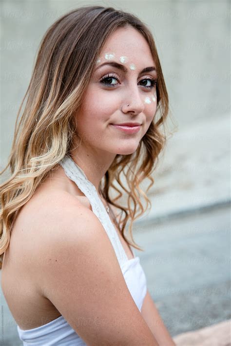 Profile Of A Beautiful Teenager With Glow In The Dark Paint On Her