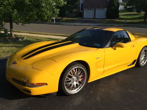 02 C5 Z06 Millenium yellow w/stripes 36K Miles asking $22K