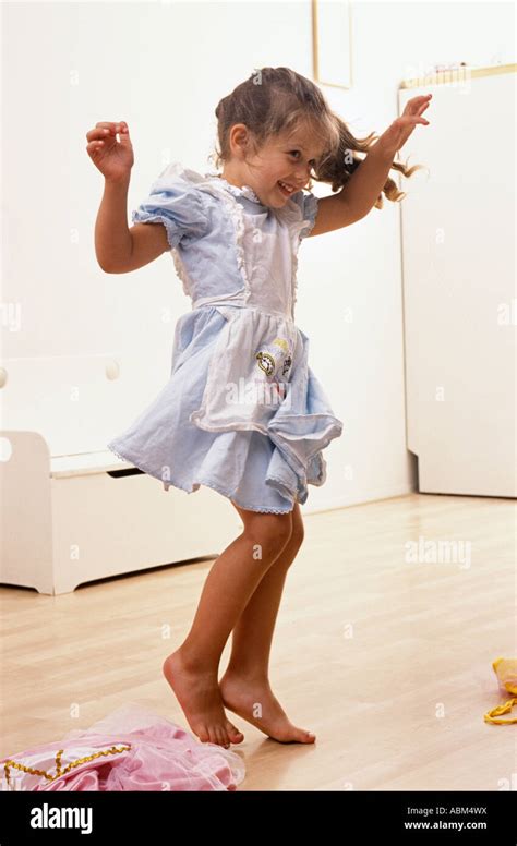 Little Girl Is Dancing Around Stock Photo Alamy