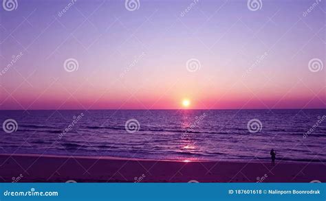Purple Sunset Sky With Beautiful Bright Sun Light Shining Through