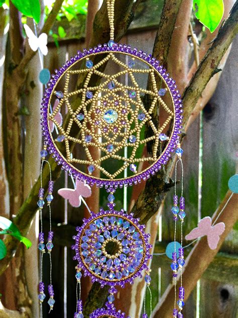 Check out our beaded dreamcatcher selection for the very best in unique or custom, handmade pieces from our wall hangings shops. Beaded Dream catcher with Swarovski crystals #dreamcatcher ...