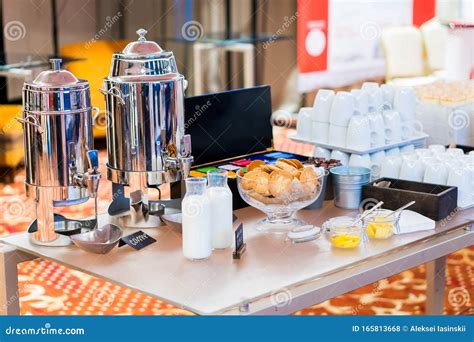 Coffee Bottles Of Milk Cups On Catering Table At Conference Group Of