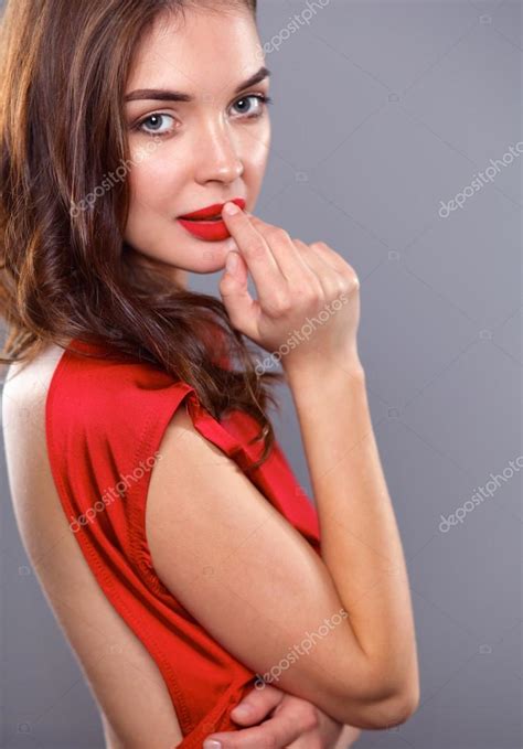 Young Beauty Woman In Red Dress — Stock Photo © Lenetstatsiana 78371388