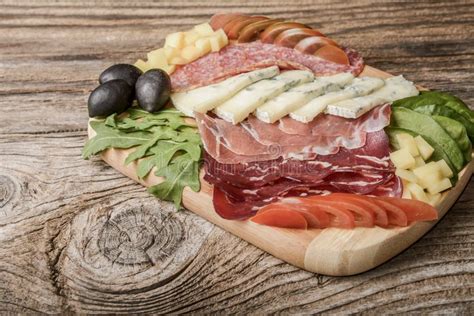 Blue Cheese And Cold Meat Platter With Salami Slices Ham Prosciutto