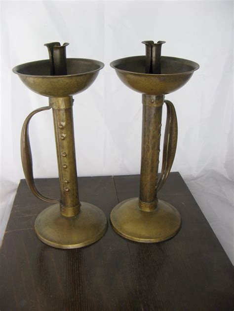 Antiques Atlas Arts And Crafts Pair Of Candlesticks