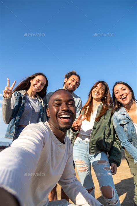 Smiling Multiracial Friends Take Selfie Looking At Camera Copy Space