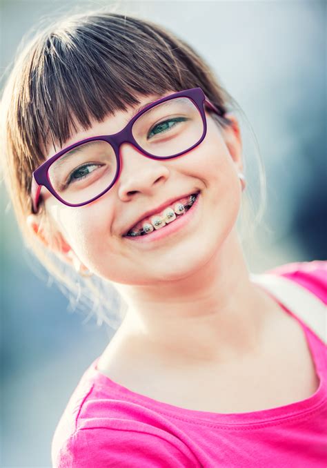 Girl Pre Teen Girl With Glasses Girl With Teeth Braces Cosmetic