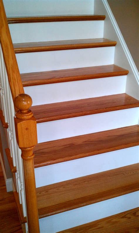 Small, handheld sander or sanding block. Stairs Refinishing & Repairs | New England Floor Sanding