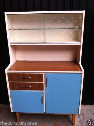 • use cabinets that have been stripped of paint so they have a vintage look to them. Vintage 1960s Retro Kitchen Formica Baby Blue Kitchen ...